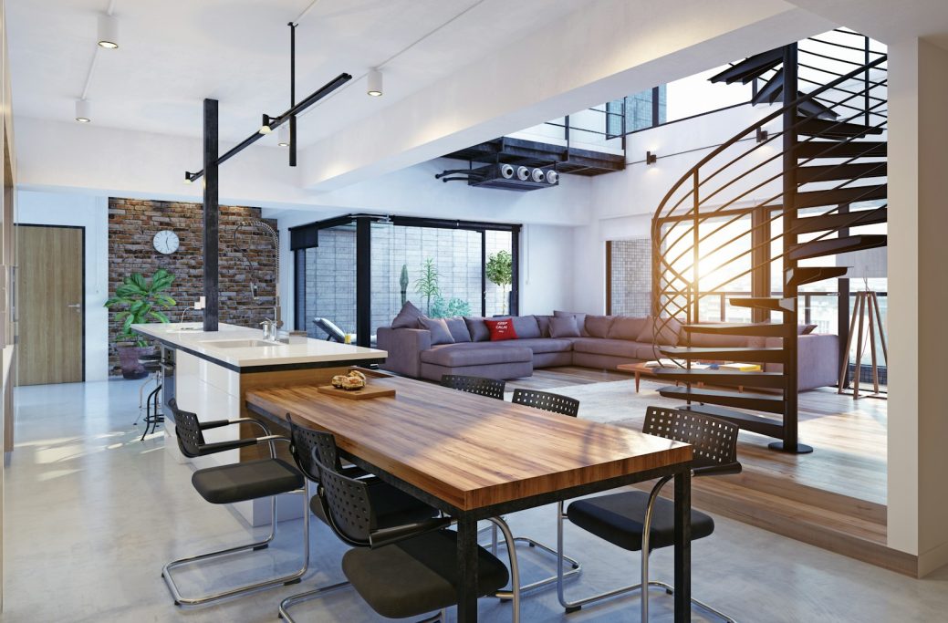 Home Renovation Modern open-plan living space with a dining table, spiral stairs, and large windows.
